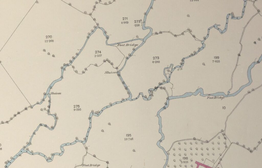 A vintage map showing a section of a river and field boundaries