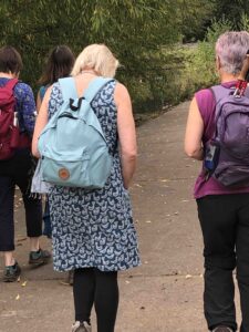 Friends taking part in the story pilgrimage, walking up the River Culm